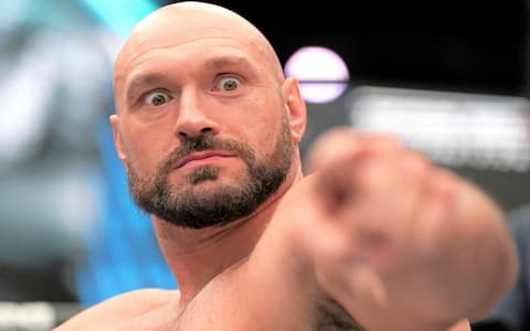 如果泰森弗瑞正式加入WWE，你希望看到他和谁进行比赛？