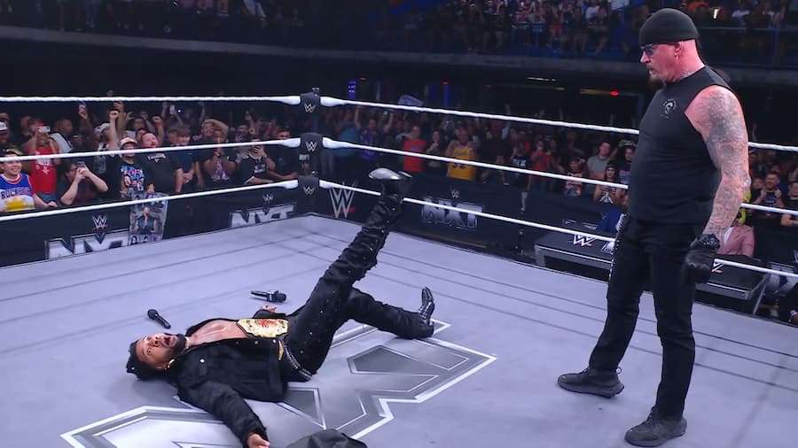 送葬者(The Undertaker)惊现NXT,锁喉抛摔(Chokeslam)TNA冠军特里克·威廉姆斯(Trick Williams),引爆网络!